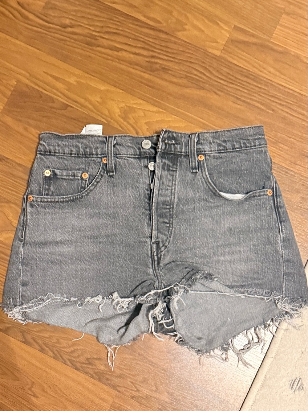 Levi's Washed Black Distressed Frayed Hem Jean Shorts
